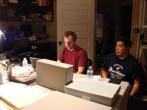 Colin Post and Cornelio Campos working on Cornelio's archival collection.