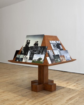Jill Magid. Der Trog, 2013. Installation: Facistol (pine lectern inspired by Luis Barragán, mounted reproductions from Luis Barragán’s personal archive), architectural model. Dimensions variable. Courtesy of Yvon Lambert, Paris and RaebervonStenglin, Zurich.